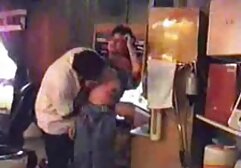 The brunette is fucked her cunt with huge porn film online vibrator